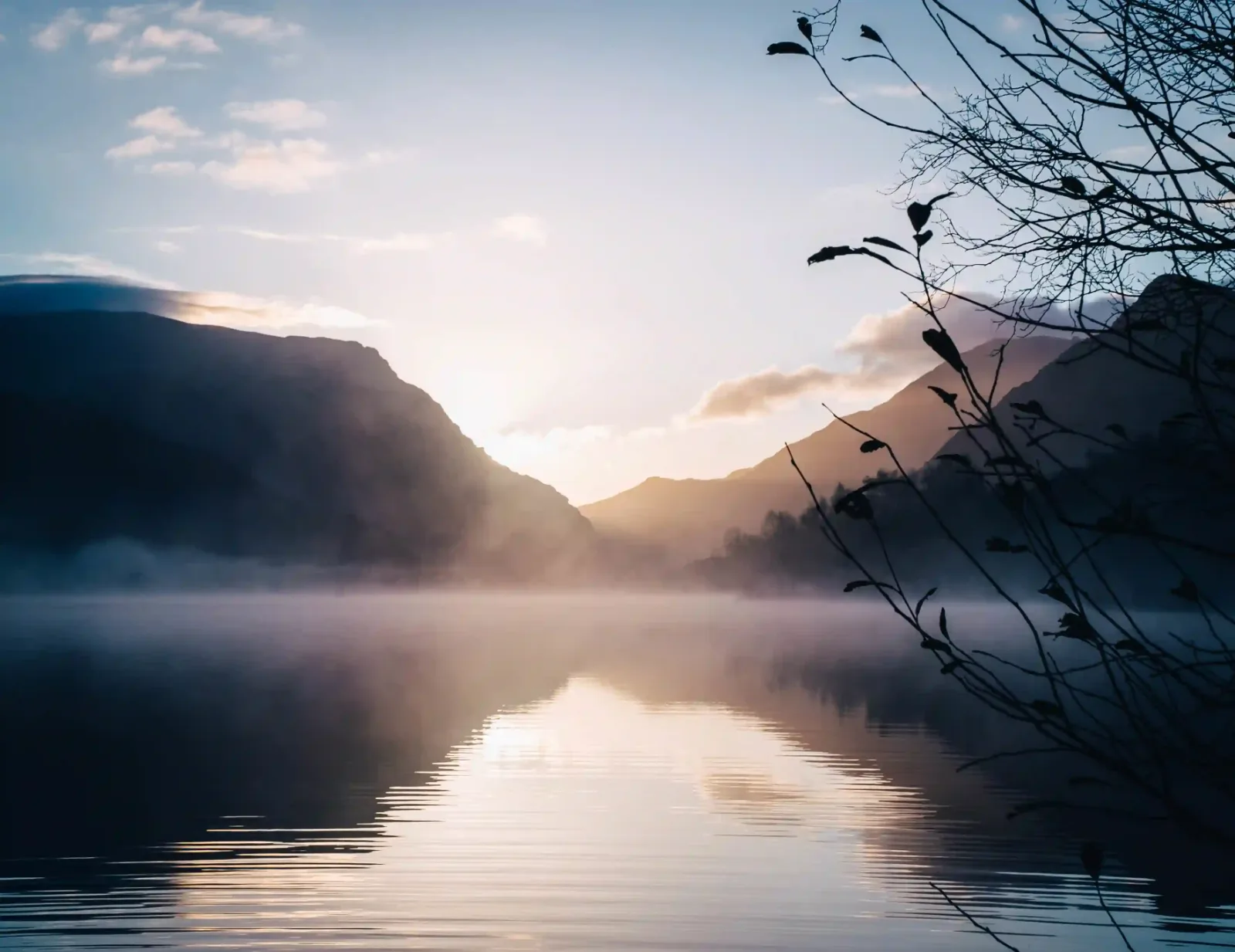 Misty mountain lake at sunrise, a classic landscape photography scene